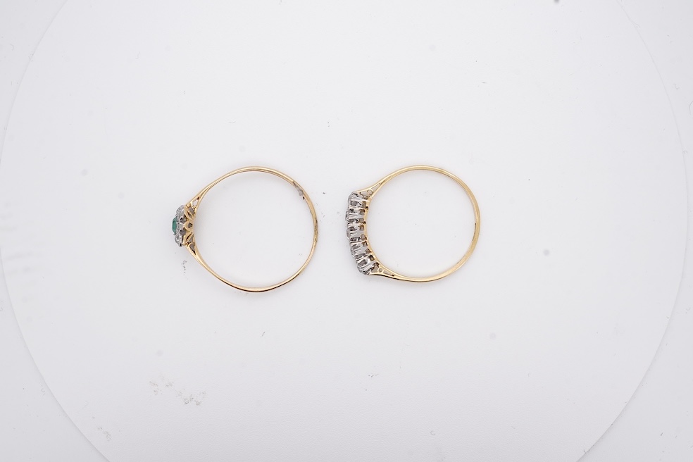 An 18ct and plat. five stone diamond set half hoop ring, size V together with a yellow metal emerald and diamond set tablet ring, size Z+++, gross weight 4.5 grams. Condition - fair